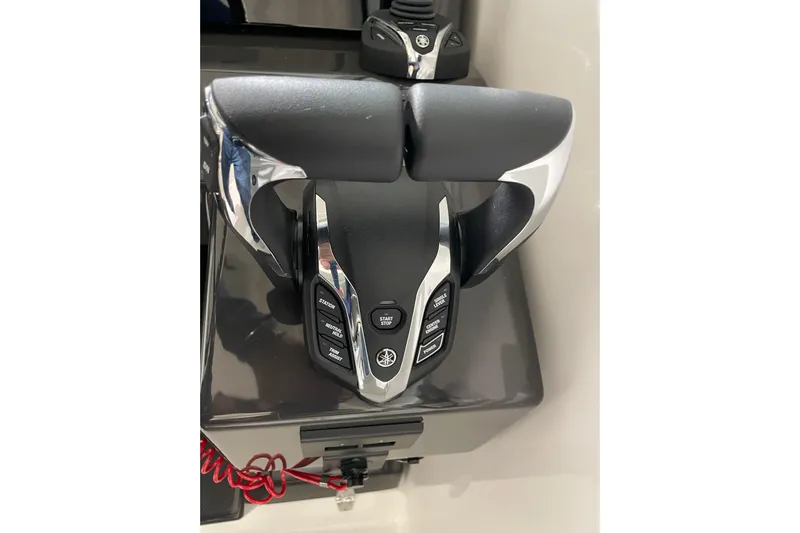  Yacht Photos Pics Throttle controls of 2024 Pursuit DC 326 Dual Console boat, featuring ergonomic design.