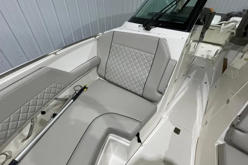  Yacht Photos Pics 2024 Pursuit DC 326 Dual Console boat interior with gray quilted seating.