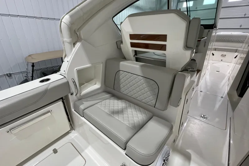  Yacht Photos Pics 2024 Pursuit DC 326 Dual Console interior with luxurious seating and modern design.