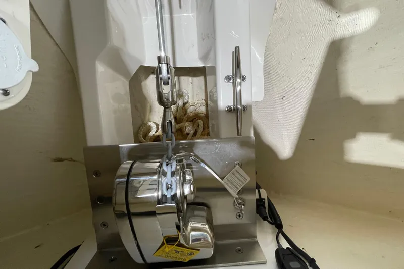  Yacht Photos Pics 2024 Pursuit DC 326 Dual Console anchor system with chain and rope.