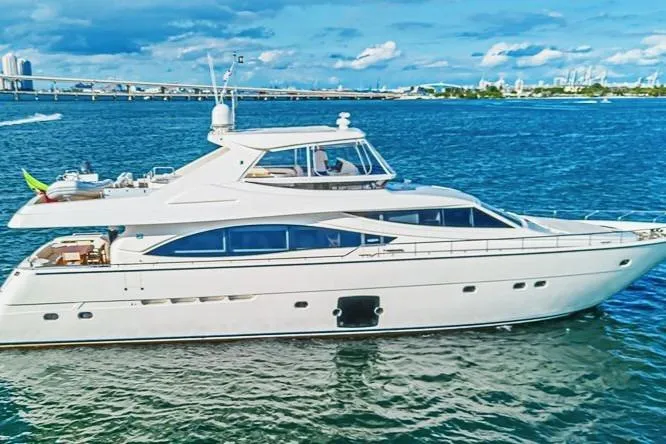 Noral Yacht Photos Pics Luxury 2011 Ferretti Yachts 830 cruising on blue waters under a clear sky.