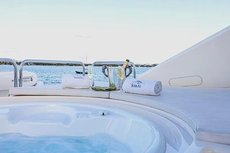 Noral Yacht Photos Pics Luxurious Ferretti Yachts 830, 2011 model, featuring a jacuzzi with champagne and ocean view.