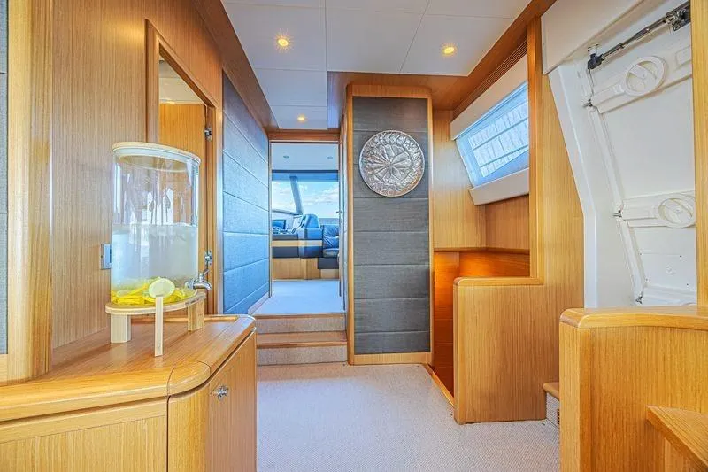 Noral Yacht Photos Pics Luxurious interior of 2011 Ferretti Yachts 830 with elegant wood finishes and modern decor.
