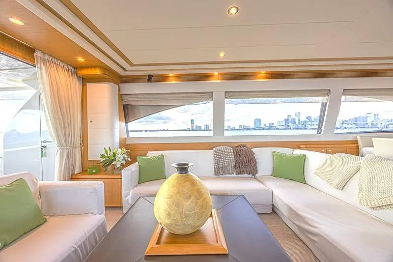 Noral Yacht Photos Pics Luxurious interior of 2011 Ferretti Yachts 830 with elegant seating and cityscape view.