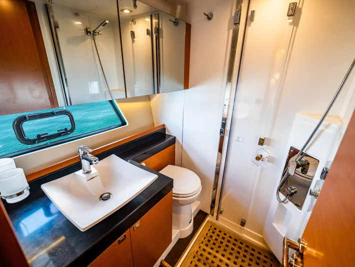 Whiskey And Waves Yacht Photos Pics Luxurious bathroom in 2017 Prestige 500 yacht with modern fixtures and elegant design.