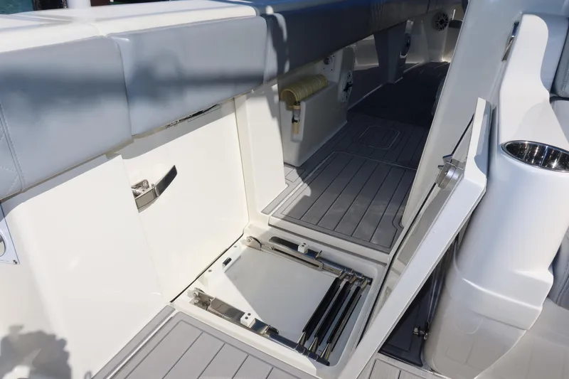  Yacht Photos Pics 2020 SeaVee 370z boat interior with open storage compartments and sleek design.
