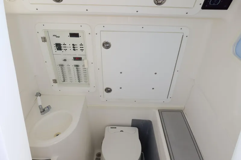  Yacht Photos Pics 2020 SeaVee 370z boat interior with control panel, sink, and toilet.