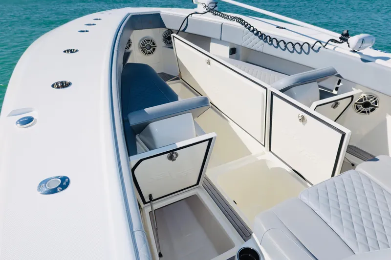  Yacht Photos Pics 2020 SeaVee 370z boat interior with open storage compartments and seating.