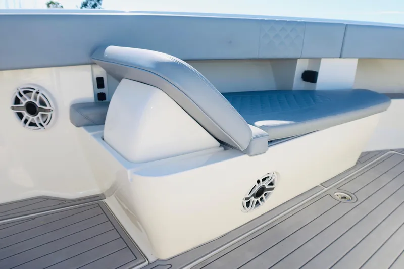  Yacht Photos Pics 2020 SeaVee 370z boat interior with cushioned seating and built-in speakers.