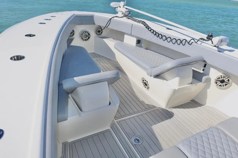 Yacht Photos Pics 2020 SeaVee 370z boat interior with cushioned seating and speakers.