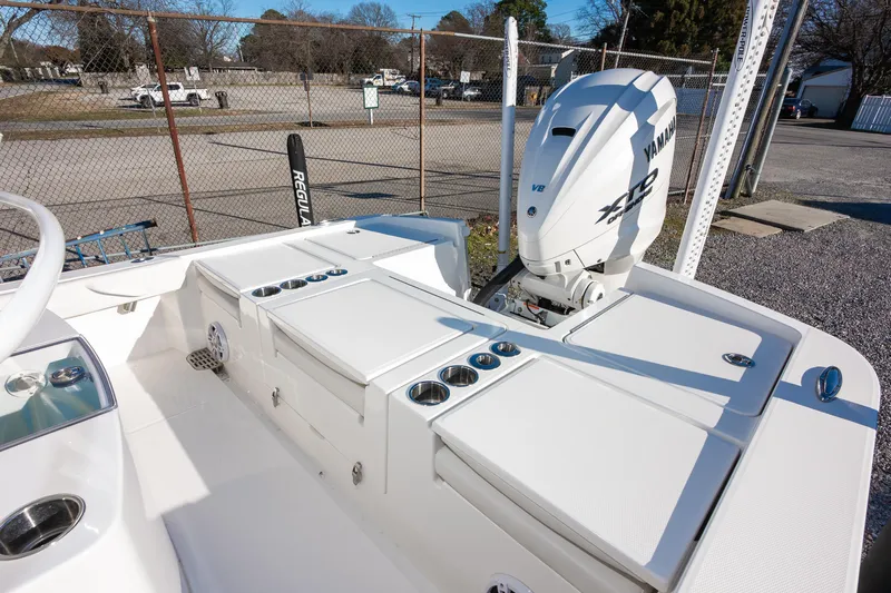 Our Trade Yacht Photos Pics 2024 Regulator 26XO boat with Yamaha V8 engine, featuring sleek white deck design.