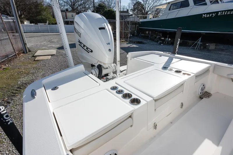 Our Trade Yacht Photos Pics 2024 Regulator 26XO boat with Yamaha V8 engine, featuring spacious deck and storage compartments.