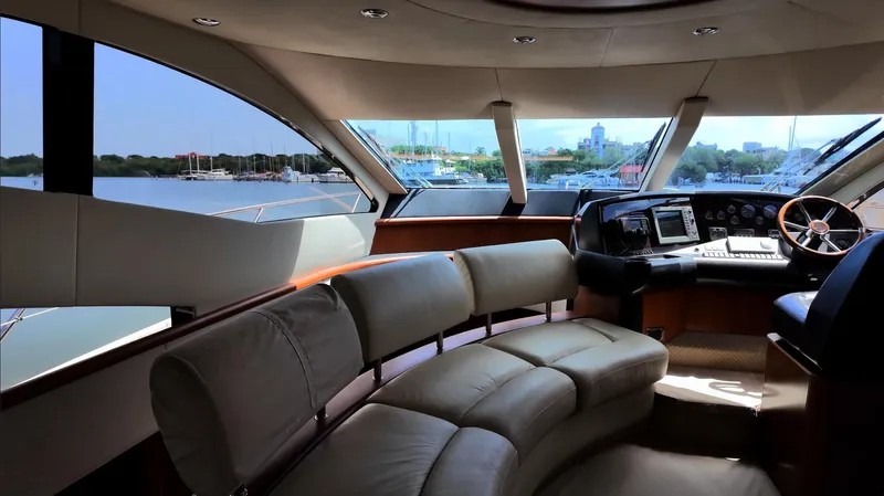 Itaca Yacht Photos Pics Luxurious interior of a 2008 Sunseeker Manhattan 60 yacht with panoramic windows.