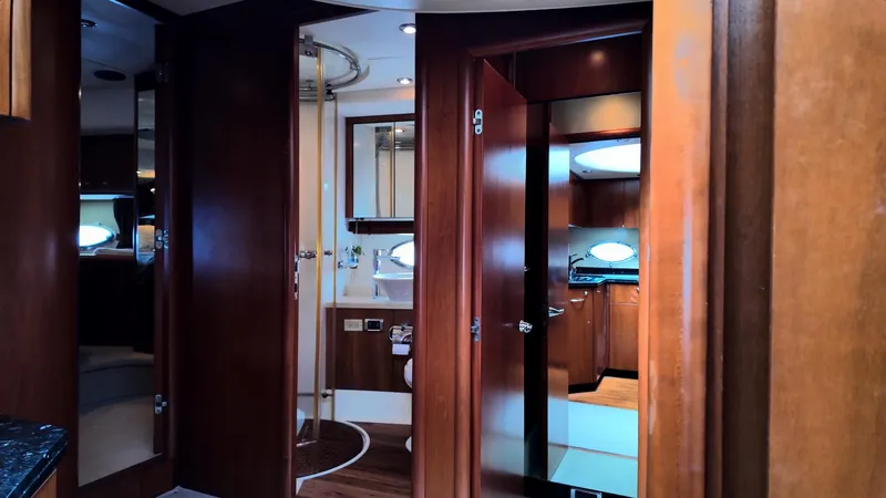 Itaca Yacht Photos Pics Luxurious interior of 2008 Sunseeker Manhattan 60 yacht with wood finishes and modern amenities.