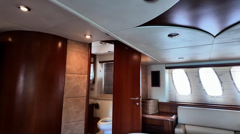 Itaca Yacht Photos Pics Luxurious interior of 2008 Sunseeker Manhattan 60 yacht with elegant wood finishes.