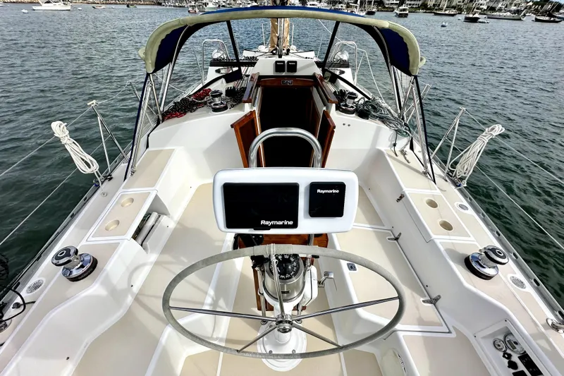 Blue Aweigh Yacht Photos Pics Cockpit view of 2021 Tartan 345 sailboat with Raymarine navigation system.