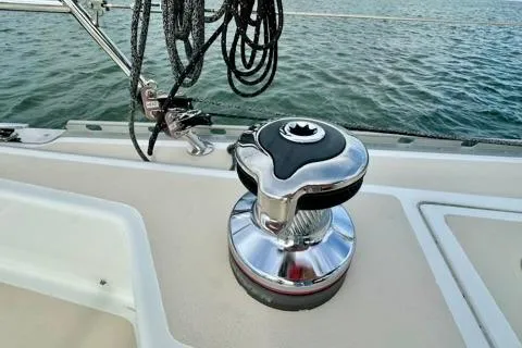 Blue Aweigh Yacht Photos Pics Sailboat deck with winch, Tartan 345, 2021 model, on calm water.