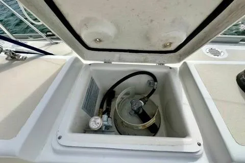 Blue Aweigh Yacht Photos Pics Open storage compartment on 2021 Tartan 345 sailboat deck.