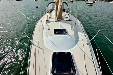 Blue Aweigh Yacht Photos Pics 2021 Tartan 345 sailboat on water, showcasing deck and hatch details.