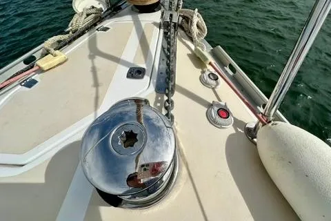 Blue Aweigh Yacht Photos Pics Deck of 2021 Tartan 345 sailboat with winch and anchor chain.