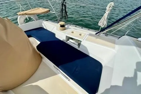 Blue Aweigh Yacht Photos Pics 2021 Tartan 345 sailboat deck with blue cushions and nautical ropes.