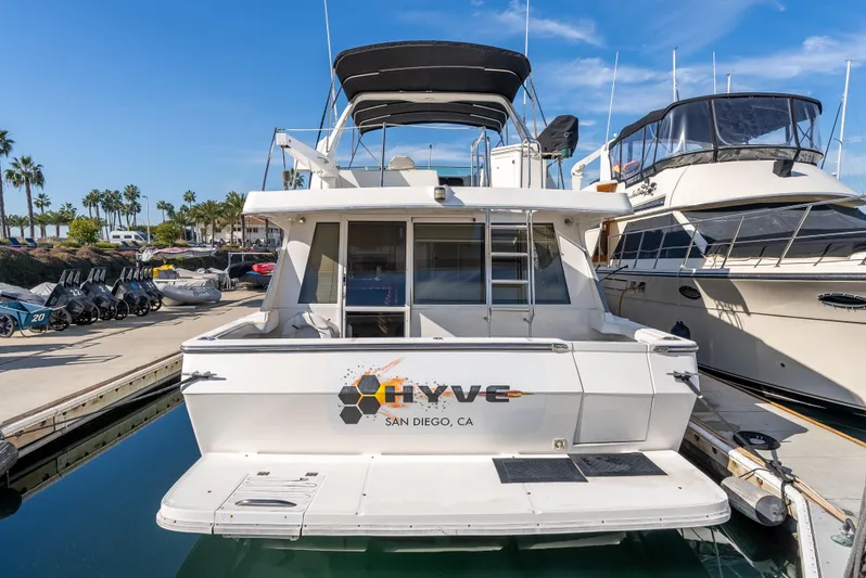 Hyve Yacht Photos Pics 2001 Bayliner 4788 Pilothouse yacht docked in San Diego marina.