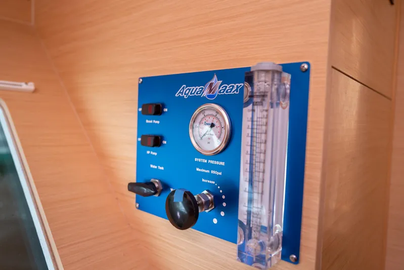 Dream Seeker Yacht Photos Pics Control panel on Lagoon 380 S2 yacht, featuring pressure gauge and switches, 2011 model.