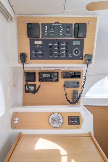 Dream Seeker Yacht Photos Pics Control panel of a 2011 Lagoon 380 S2 catamaran, featuring navigation and communication equipment.