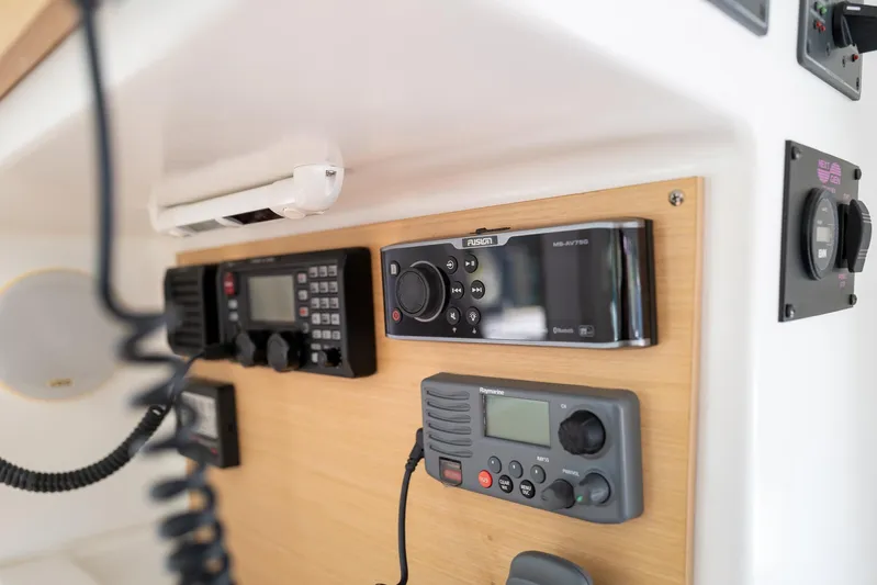 Dream Seeker Yacht Photos Pics Control panel of a 2011 Lagoon 380 S2 yacht with communication and audio equipment.