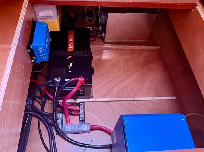 Dream Seeker Yacht Photos Pics Electrical setup inside a 2011 Lagoon 380 S2, featuring LiTime battery and wiring components.