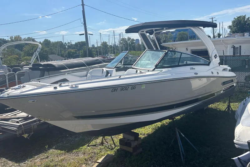  Yacht Photos Pics 2021 Monterey 298 Super Sport boat on display in a marina setting.