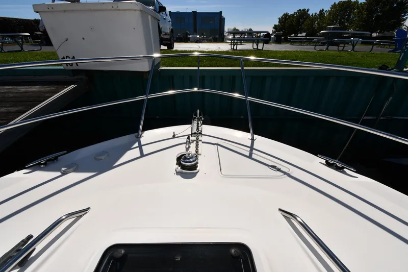 Nina Yacht Photos Pics Bow view of 2002 Sea Ray 480 Sedan Bridge yacht docked at marina.
