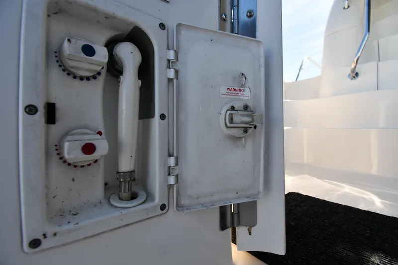 Nina Yacht Photos Pics 2002 Sea Ray 480 Sedan Bridge yacht shower controls and compartment.