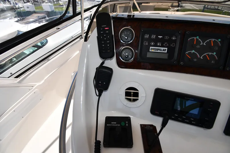 Nina Yacht Photos Pics Control panel of a 2002 Sea Ray 480 Sedan Bridge yacht with navigation instruments.