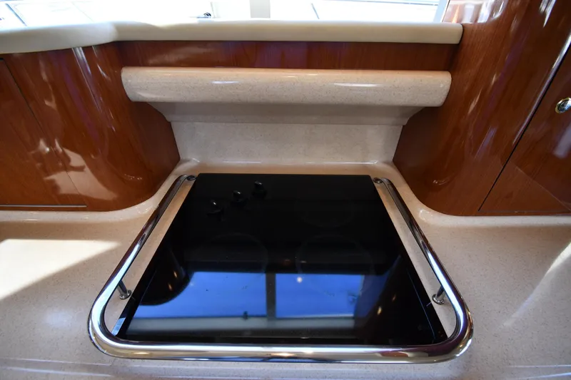 Nina Yacht Photos Pics Modern kitchen area in a 2002 Sea Ray 480 Sedan Bridge yacht.