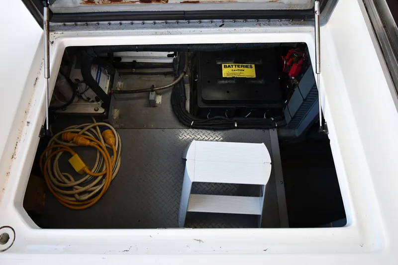 Nina Yacht Photos Pics 2002 Sea Ray 480 Sedan Bridge engine compartment with battery and cables.