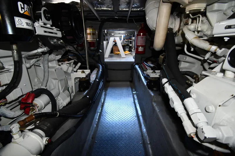 Nina Yacht Photos Pics Engine room of 2002 Sea Ray 480 Sedan Bridge, showcasing mechanical components and equipment.