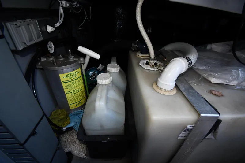 Nina Yacht Photos Pics Engine room of 2002 Sea Ray 480 Sedan Bridge with hydraulic system and containers.