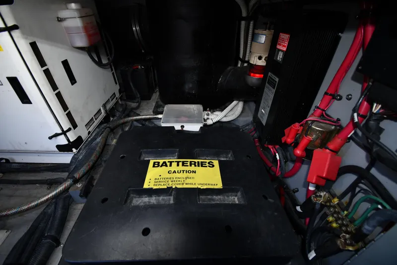 Nina Yacht Photos Pics Engine room of 2002 Sea Ray 480 Sedan Bridge with battery compartment and wiring.