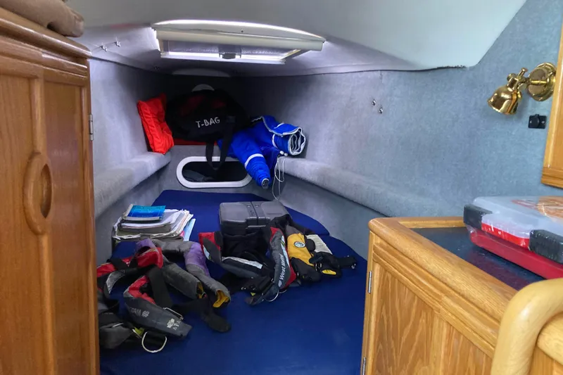 Stimulus Package Yacht Photos Pics Interior cabin of 2009 Seawind 36 1000XL with storage and equipment.