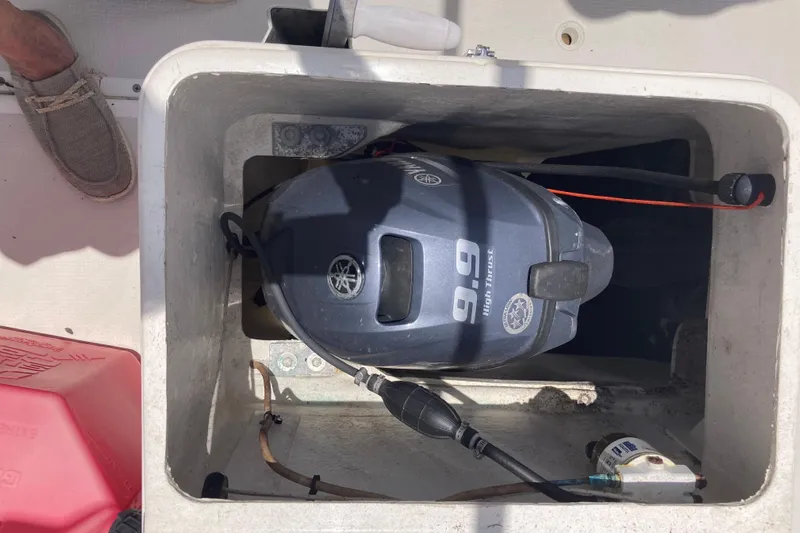 Stimulus Package Yacht Photos Pics Yamaha 9.9 high thrust outboard motor on 2009 Seawind 36 1000XL catamaran.