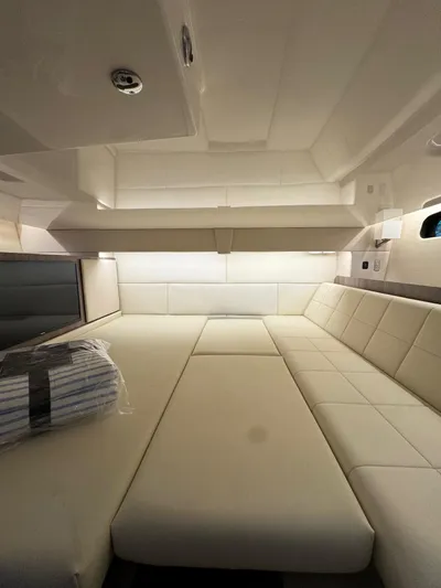  Yacht Photos Pics Luxurious interior of 2023 Regal 36 Grande Coupe yacht, featuring spacious seating and modern design.