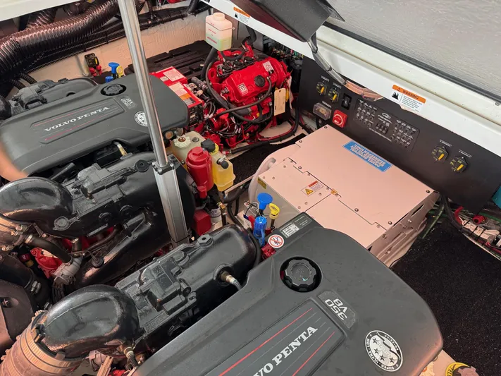  Yacht Photos Pics Engine room of 2023 Regal 36 Grande Coupe with Volvo Penta engines and control panel.