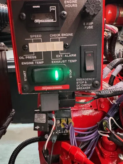  Yacht Photos Pics Control panel of 2023 Regal 36 Grande Coupe engine with various indicators and wiring.