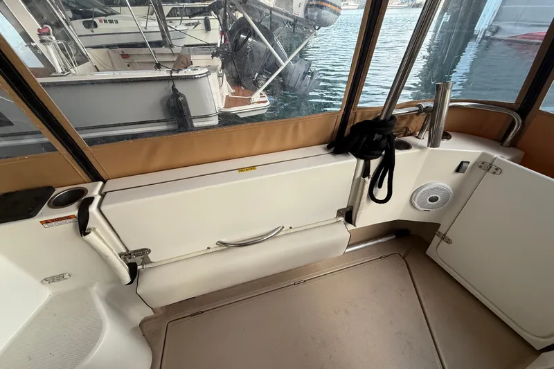  Yacht Photos Pics 2016 Ranger Tugs R-31 CB boat interior with dock view and marine equipment.
