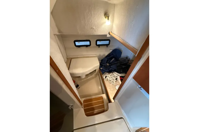 Yacht Photos Pics 2016 Ranger Tugs R-31 CB interior cabin with storage and portholes.