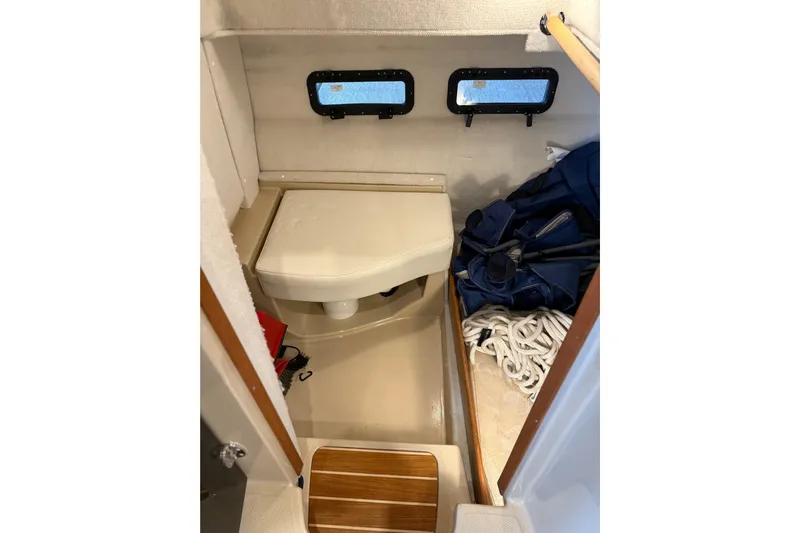  Yacht Photos Pics 2016 Ranger Tugs R-31 CB interior cabin with storage and seating area.