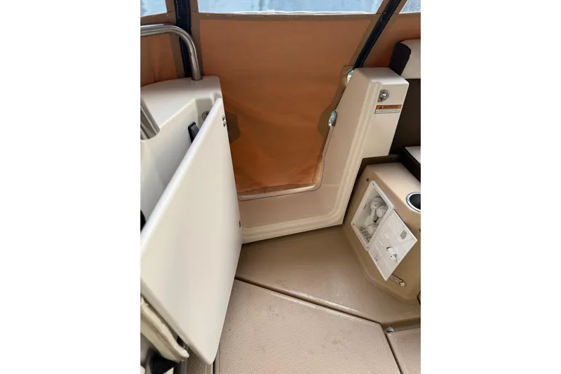  Yacht Photos Pics Interior view of 2016 Ranger Tugs R-31 CB boat, featuring a compact seating area.