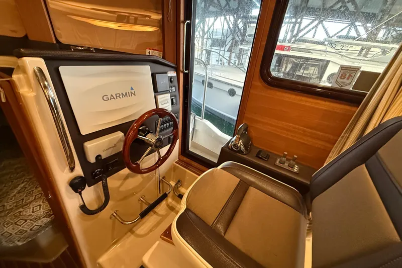  Yacht Photos Pics Interior helm of 2016 Ranger Tugs R-31 CB with Garmin navigation system.