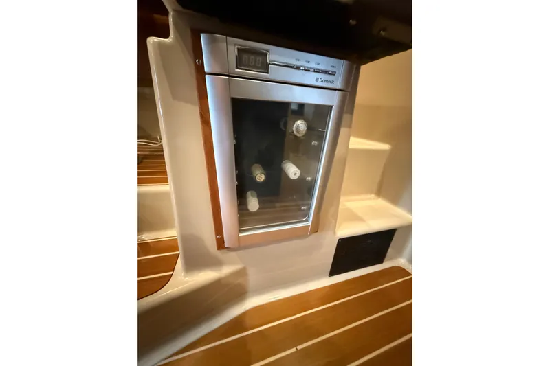  Yacht Photos Pics 2016 Ranger Tugs R-31 CB interior with built-in Dometic wine cooler.